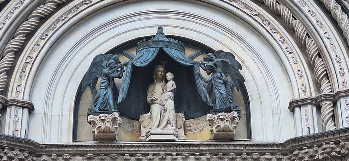 A detail of the cathedral facade in Orvieto: mosaic and marble that look finished yesterday and are over six centuries old.