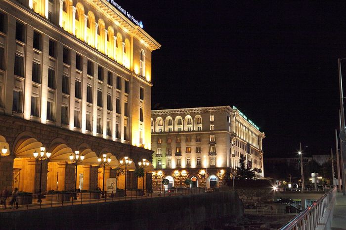 The Largo in Sofia at night, with the Council of Ministers building lit up.