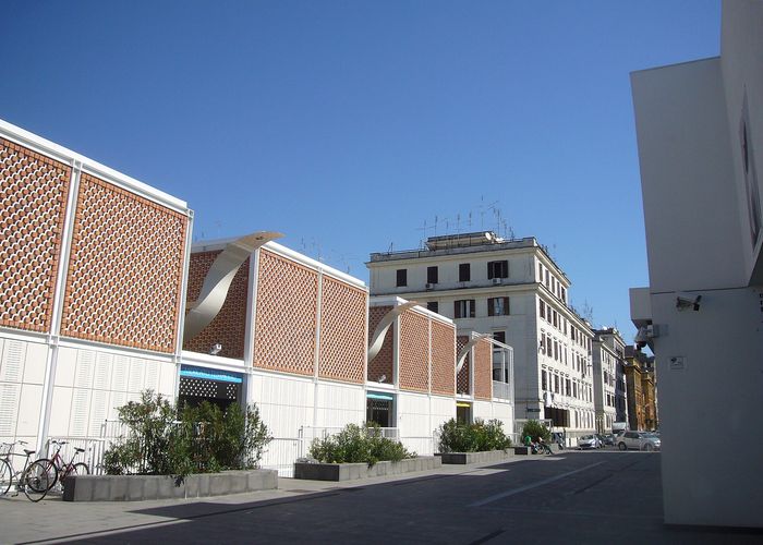 The new Testaccio market — a 2012 concrete hall the old market moved into. Plain outside, the best lunch in the neighbourhood inside.
